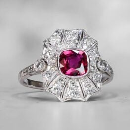 Cushion Cut Ruby and Diamond Halo Ring Artistic