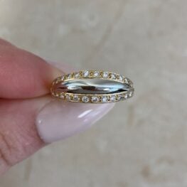 Cartier Ring with a row of diamonds on top and at the bottom of the ring