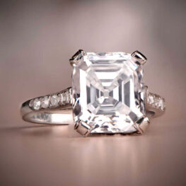 stunning vintage ring that centers a lively emerald cut diamond SB1054-Artistic-B